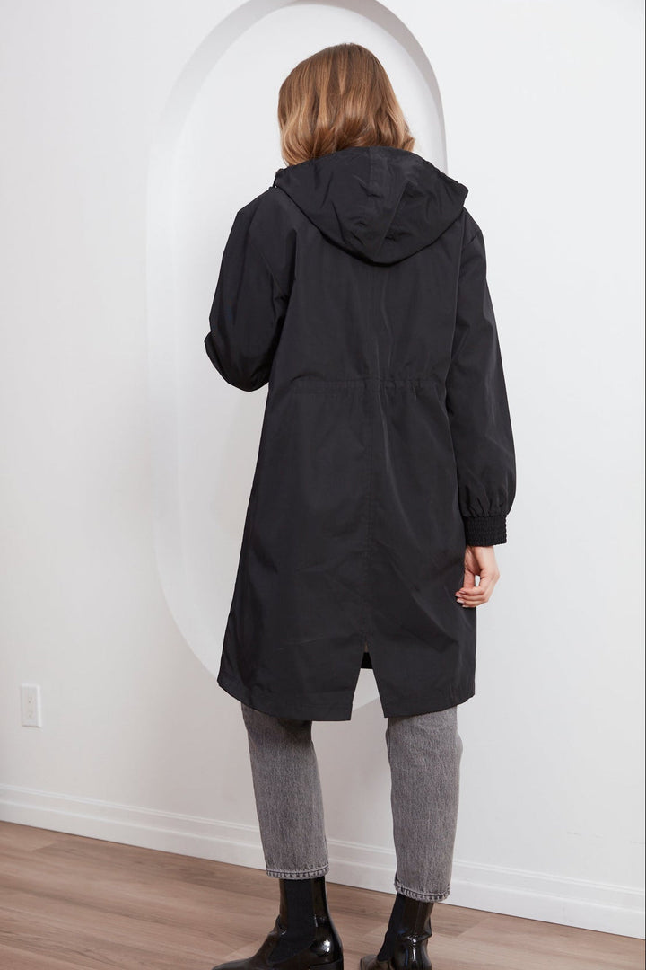 Adroit Atelier Chelsea The City Hooded Raincoat in Black available at Barbara Katz