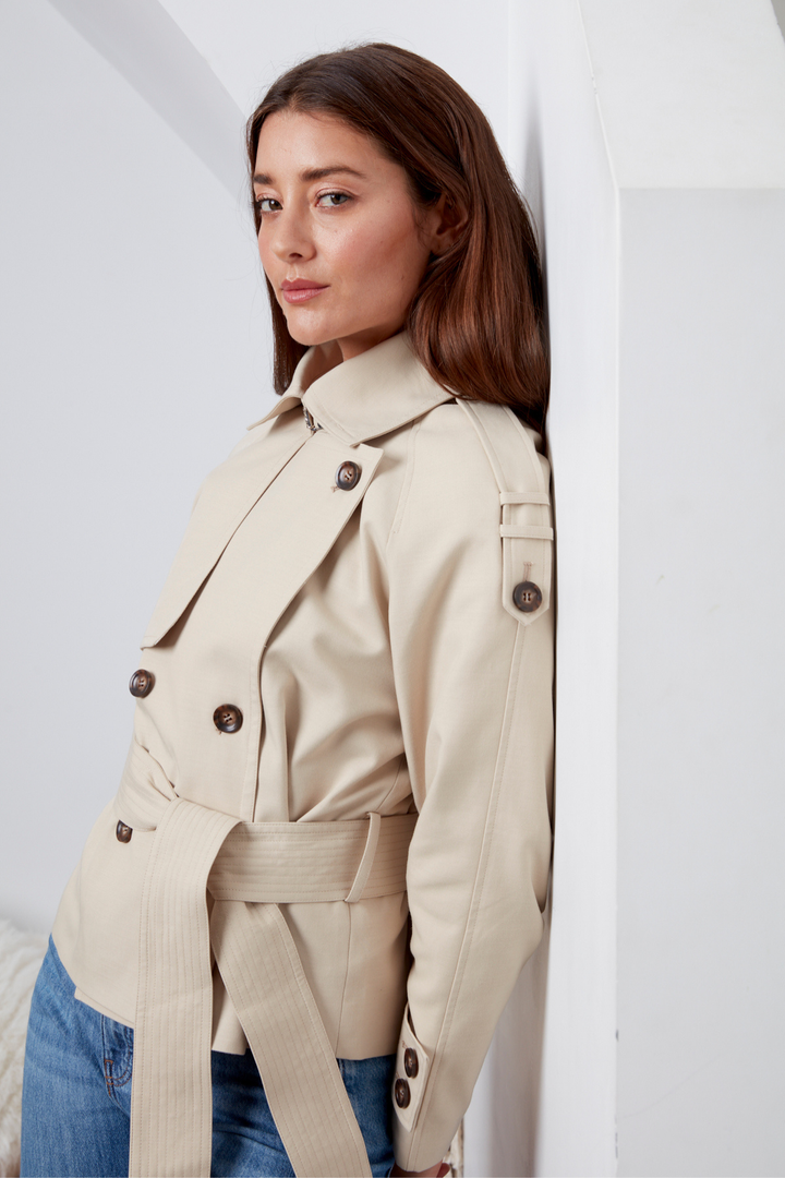 Adroit Atelier Calista Short Double Breasted Trench Coat in Sand available at Barbara Katz