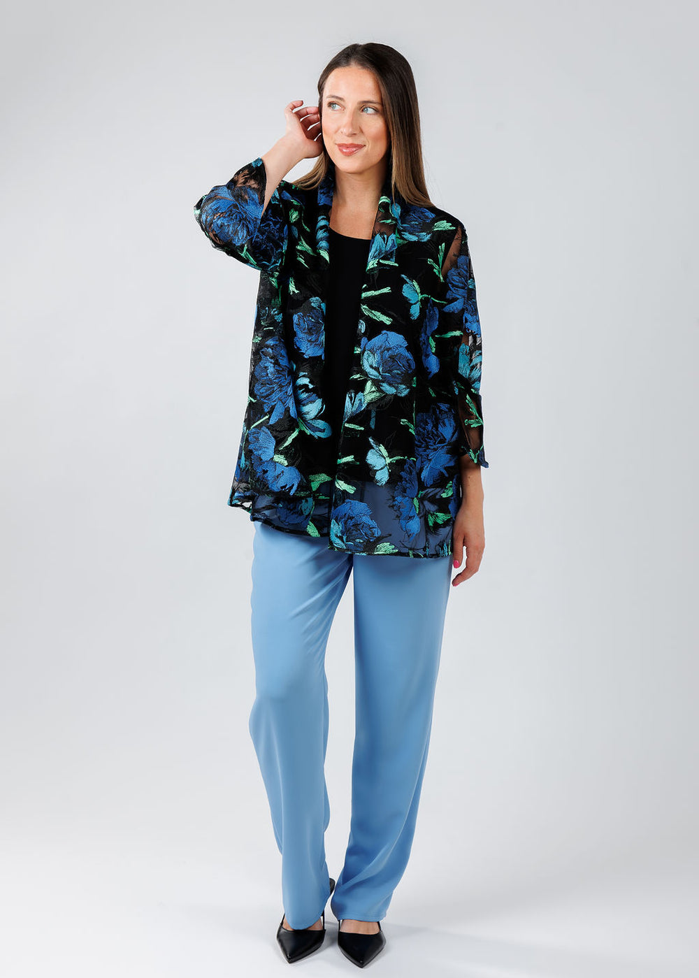 Caroline Rose Bella Embroidered Cardigan in Blue with Black Matte Crepe Tank Top underneath, paired with Caroline Rose Matte Crepe Straight Leg Pants in Blue available at Barbara Katz