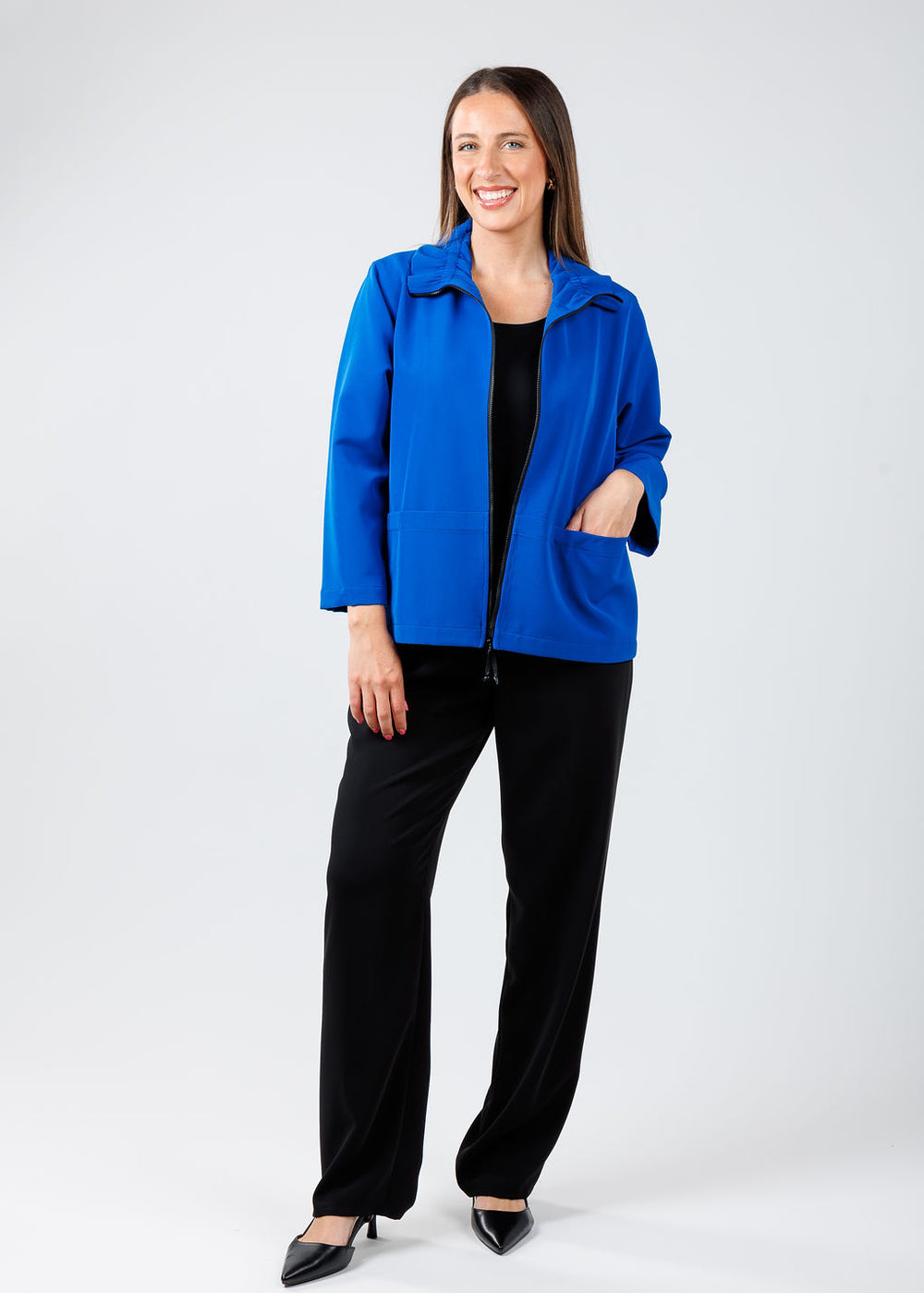 Caroline Rose Comfort Stretch Jacket in Royal Blue paired with Caroline Rose Matte Crepe Straight Leg Pants in Black available at Barbara Katz