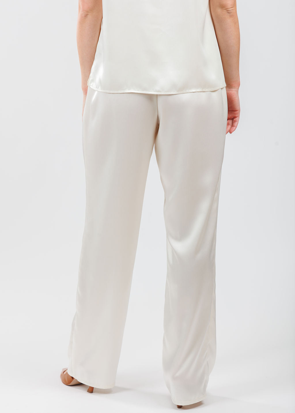Caroline Rose Soft Satin Tank in Ivory paired with matching Caroline Rose Soft Satin Pants in Ivory available at Barbara Katz