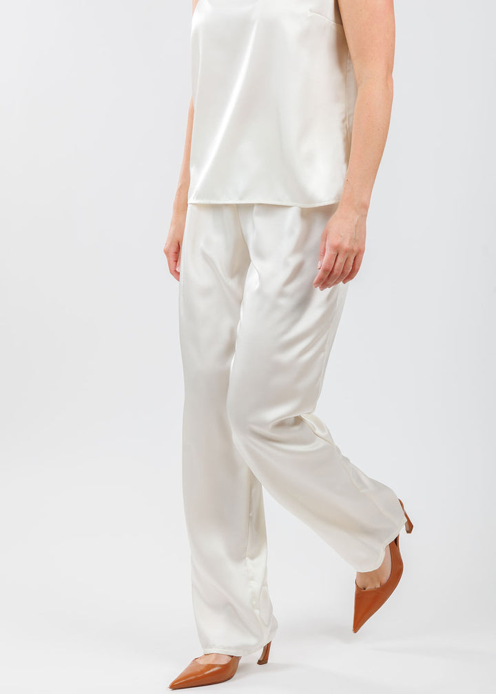 Caroline Rose Soft Satin Tank in Ivory paired with matching Caroline Rose Soft Satin Pants in Ivory available at Barbara Katz