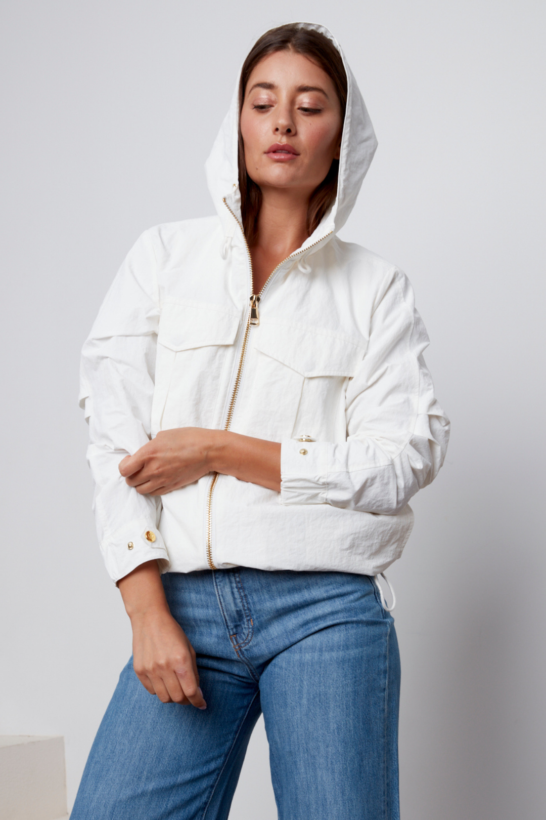 Adroit Atelier Charlie Hooded Zip Front Windbreaker in White available at Barbara Katz