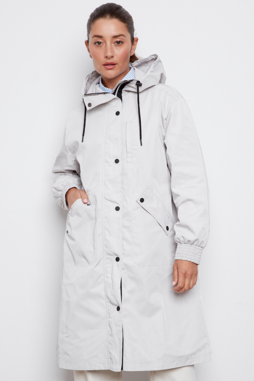 Adroit Atelier Chelsea The City Hooded Raincoat in Light Grey available at Barbara Katz