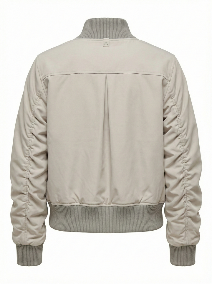 Adroit Atelier Cierra Bomber Jacket With Shirring Detail in Elephant available at Barbara Katz