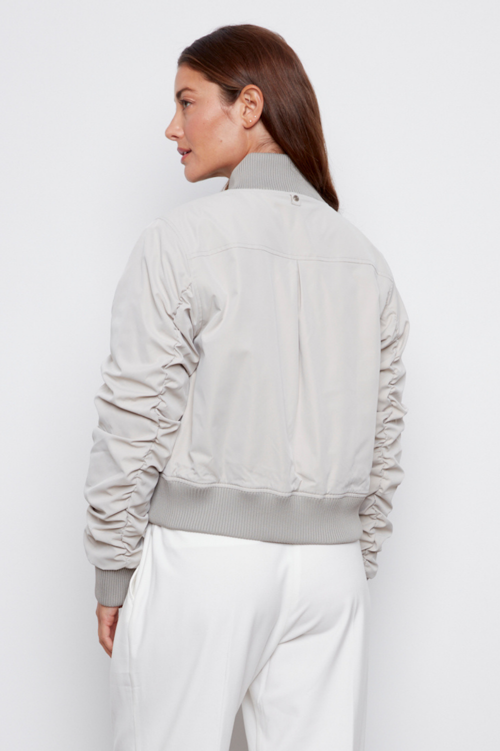 Adroit Atelier Cierra Bomber Jacket With Shirring Detail in Elephant available at Barbara Katz