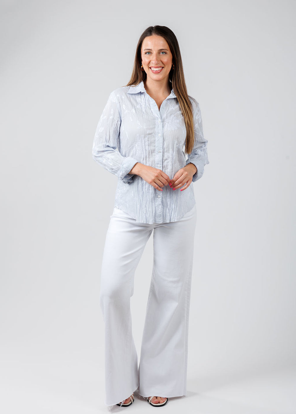 Cino Martinique Embroidered Shirt in Light Chambray paired with Pistola Denim Izzy Wide Leg Crop Pants in Vivid White available at Barbara Katz