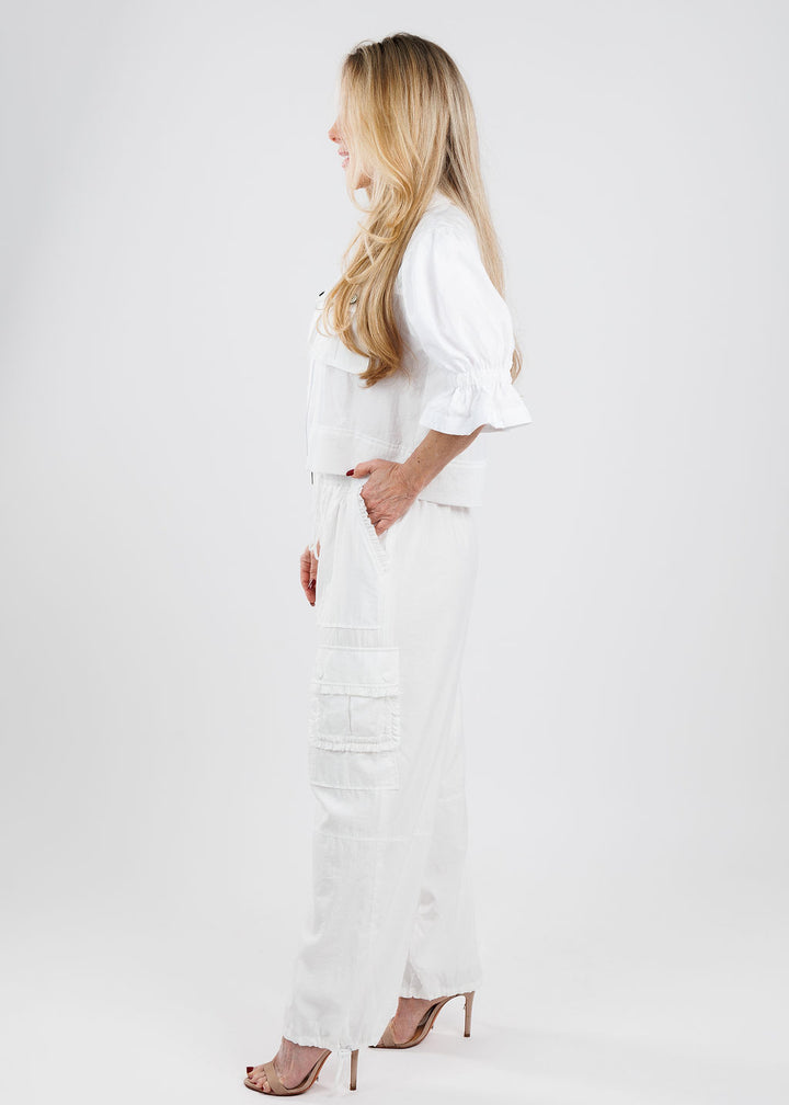 Cinq a Sept Holly Parachute Jacket in White paired with matching Cinq a Sept Nitsan Ruffle Parachute Pants in White available at Barbara Katz