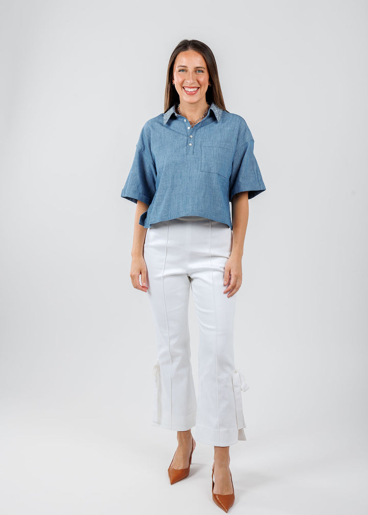 Cinq a Sept Chambray Arno Top in Medium Blue paired with Cinq a Sept Denim Lou Pants in White available at Barbara Katz