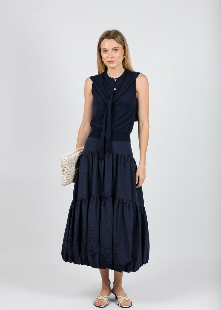 Autumn Cashmere Button Front Vest With Tie Sleeve in Navy paired with Cinq a Sept Blythe Skirt in Navy available at Barbara Katz