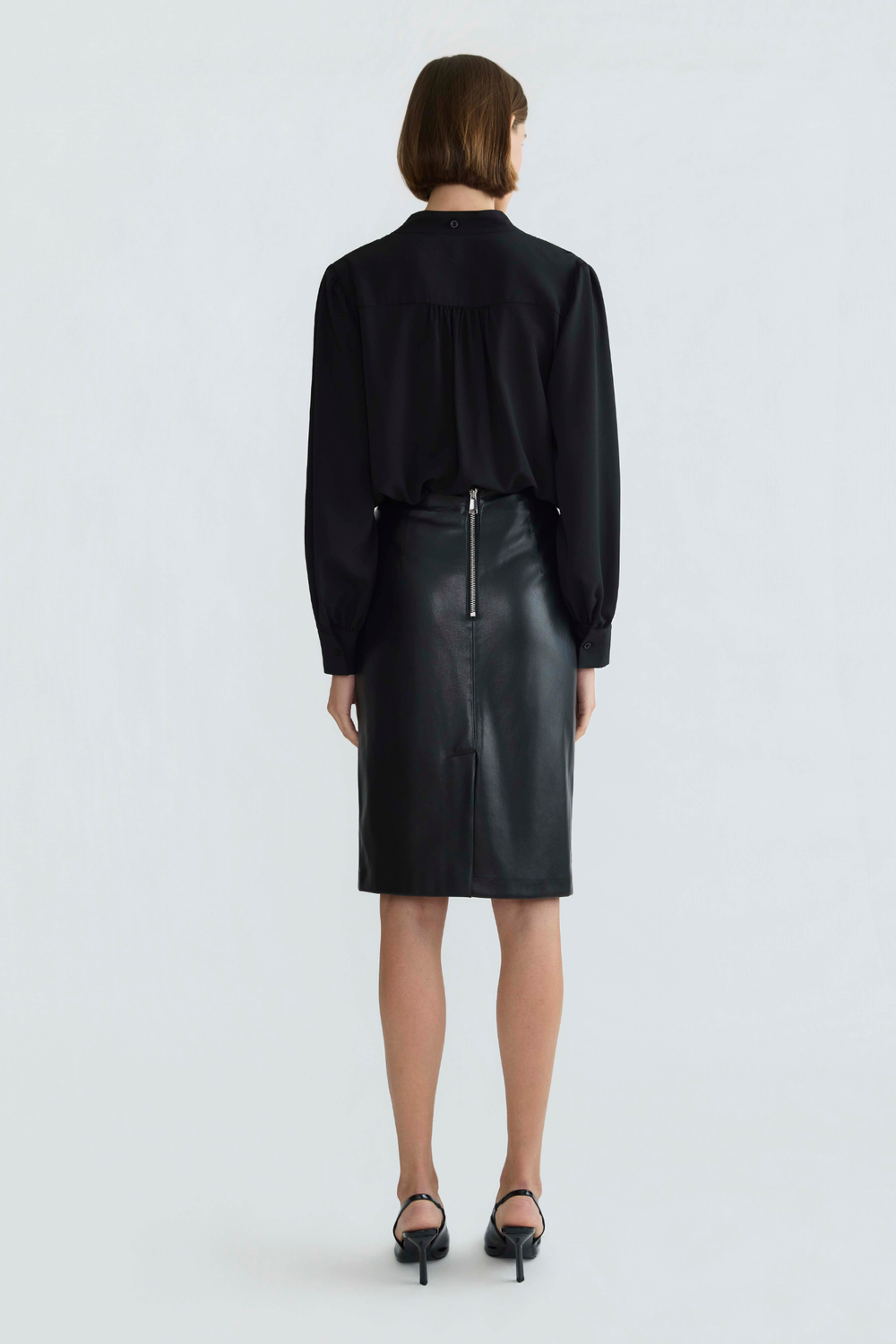 Adroit Atelier Reese Pencil Vegan Leather Skirt in Black available at Barbara Katz