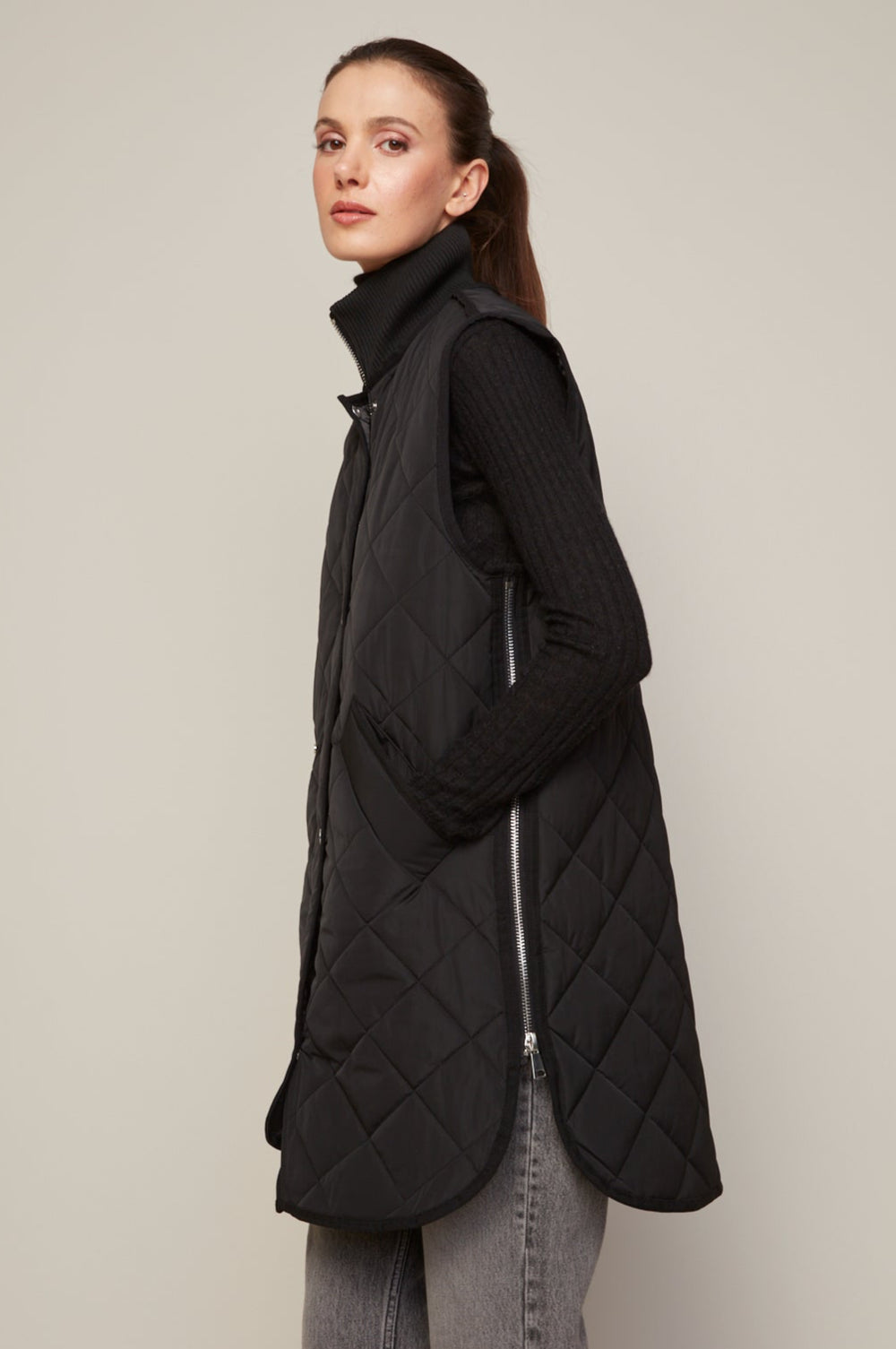 Adroit Atelier Destiny Sleeveless Quilted Vest With Zipper Detail in Black available at Barbara Katz