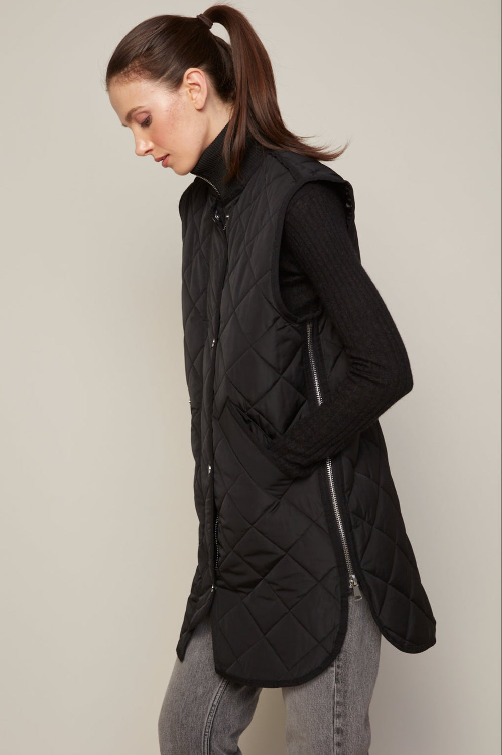 Adroit Atelier Destiny Sleeveless Quilted Vest With Zipper Detail in Black available at Barbara Katz