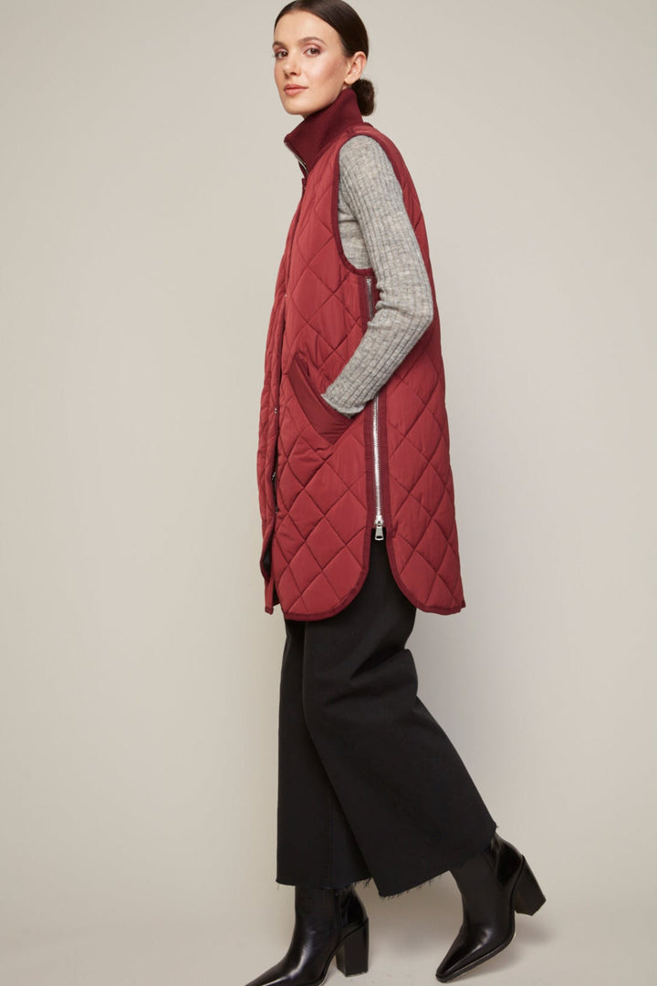 Adroit Atelier Destiny Sleeveless Quilted Vest With Zipper Detail in Porto available at Barbara Katz