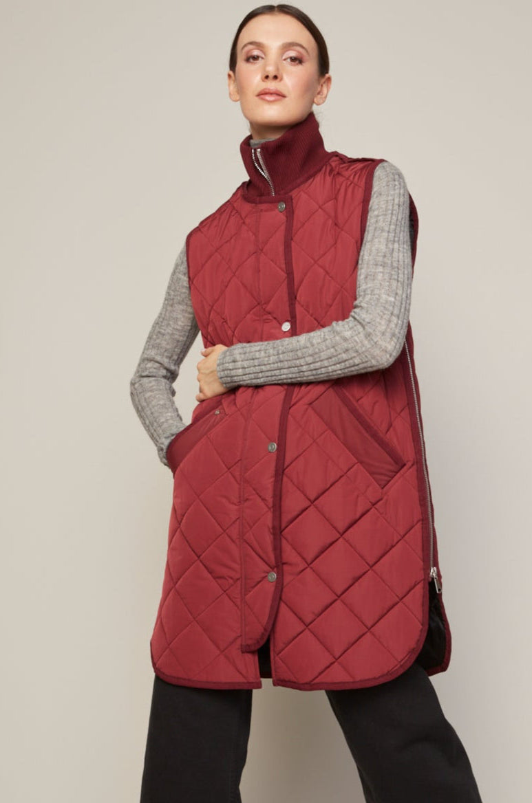 Adroit Atelier Destiny Sleeveless Quilted Vest With Zipper Detail in Porto available at Barbara Katz