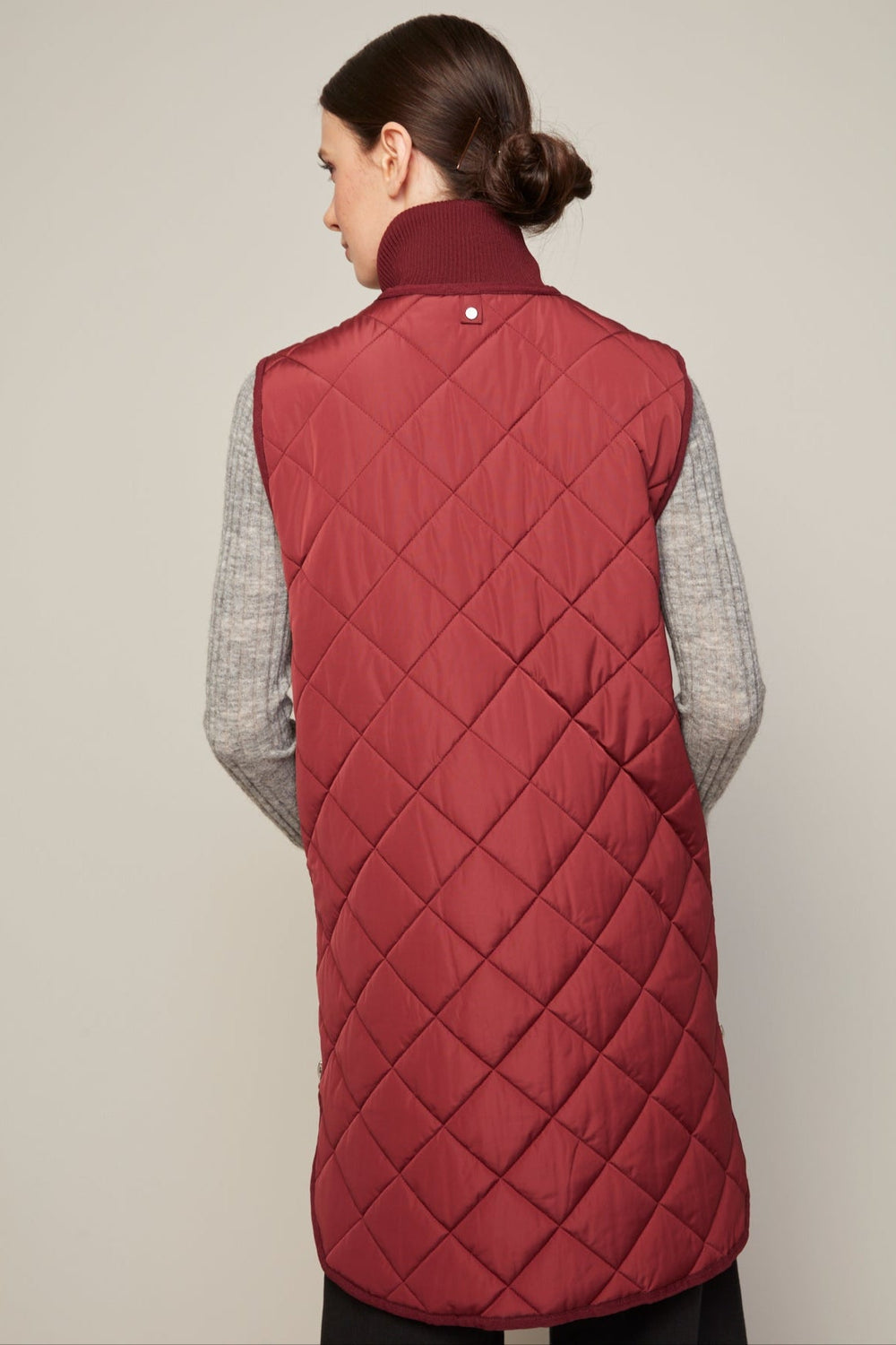 Adroit Atelier Destiny Sleeveless Quilted Vest With Zipper Detail in Porto available at Barbara Katz