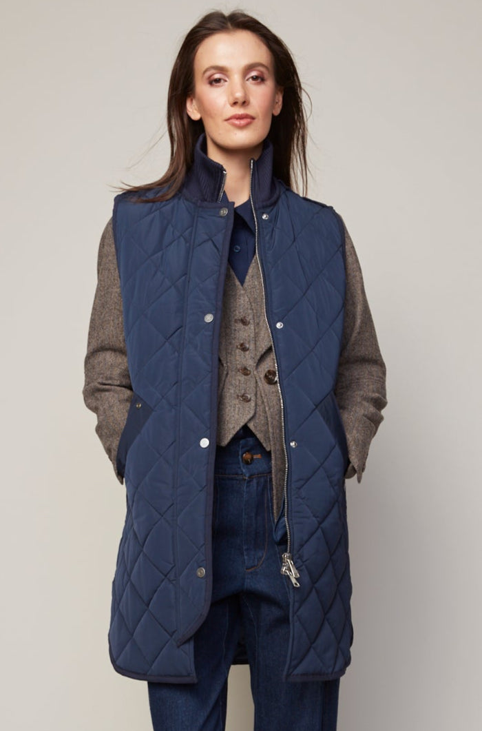 Adroit Atelier Destiny Sleeveless Quilted Vest With Zipper Detail in Navy available at Barbara Katz
