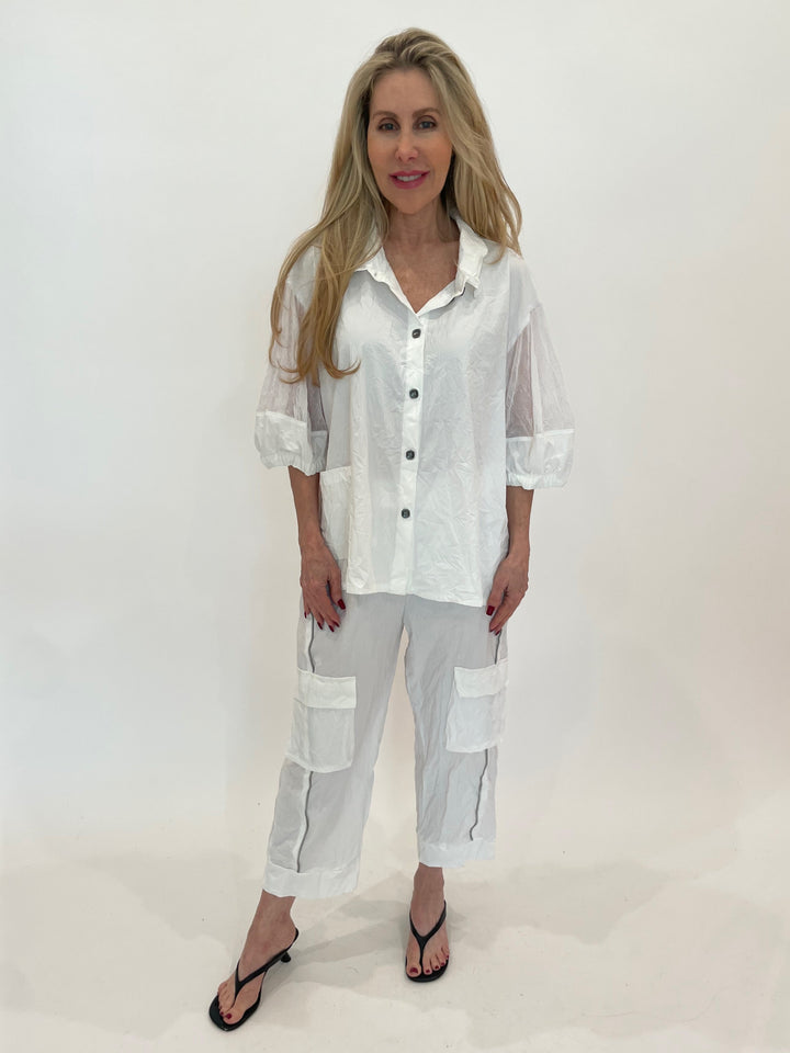 Chalet et Ceci Mylah Mesh Shirt in White paired with matching Ruelle Parachute Pants in White available at Barbara Katz