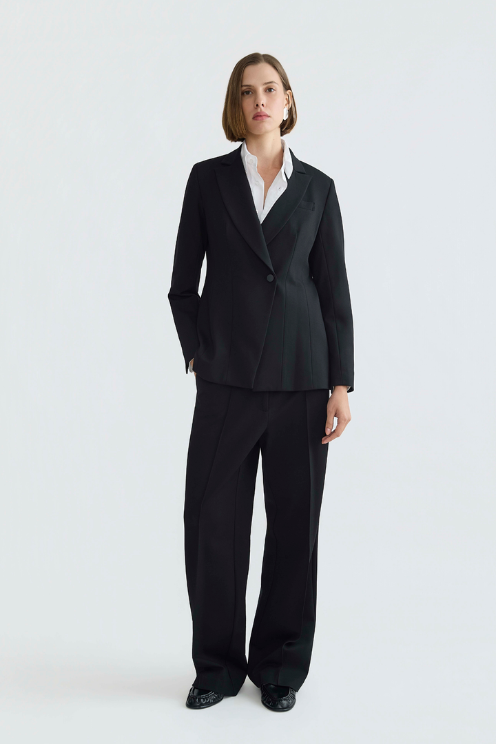 Adroit Atelier Preston Stretch Pin Tuck Ponte Pant With Slant Pockets in Black available at Barbara Katz