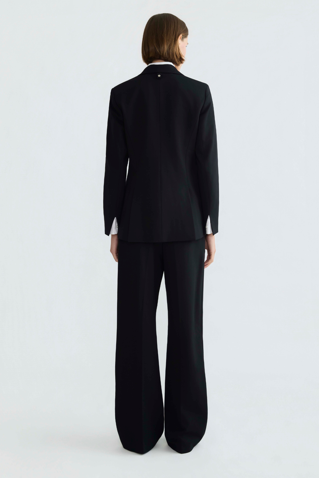 Adroit Atelier Drew Single-Breasted Asymmetrical Stretch Ponte Blazer in Black available at Barbara Katz