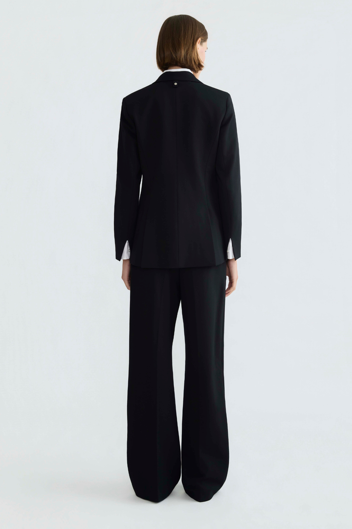 Adroit Atelier Drew Single-Breasted Asymmetrical Stretch Ponte Blazer in Black available at Barbara Katz