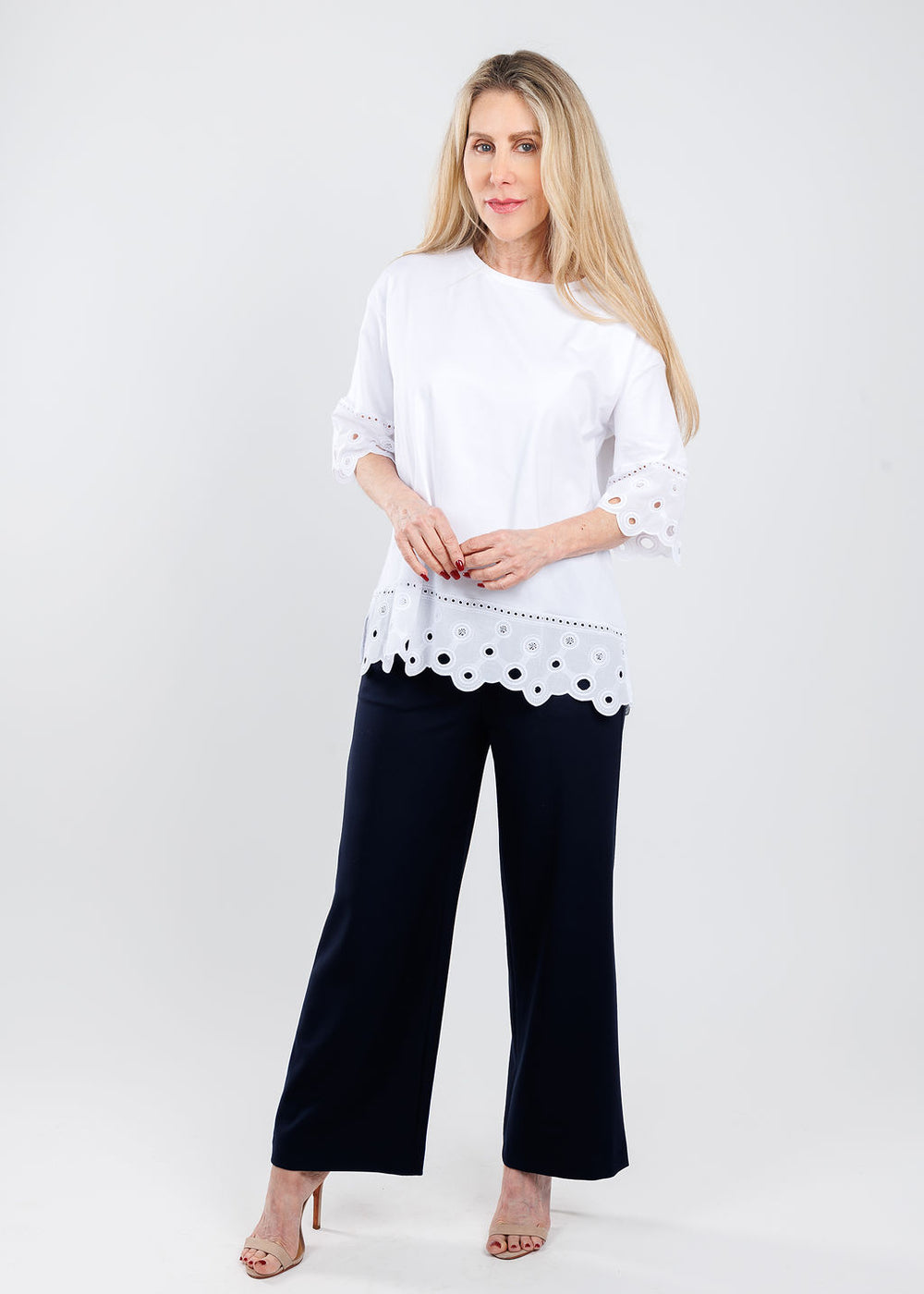 D. Exterior Bianco Blouse paired with MAC Chiara Crop Pants in Black available at Barbara Katz