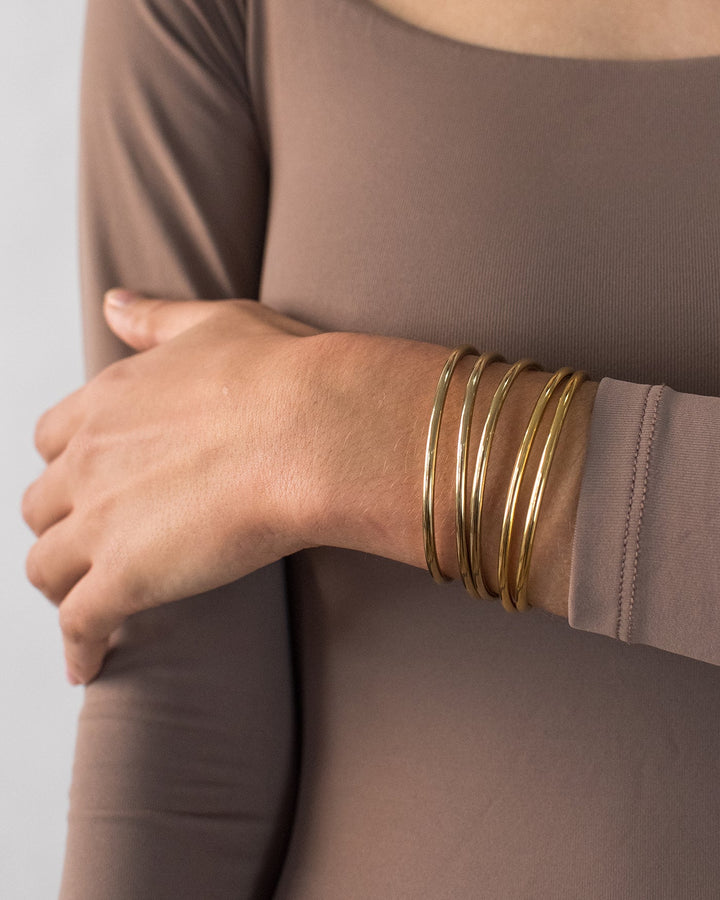 Jenny Bird Dane Bangle Set 5-Pack in Gold available at Barbara Katz