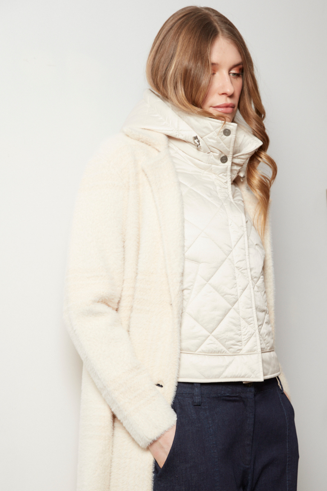 Adroit Atelier Daniela Sleeveless Diamond Quilted Vest With Detachable Hood in Champagne available at Barbara Katz