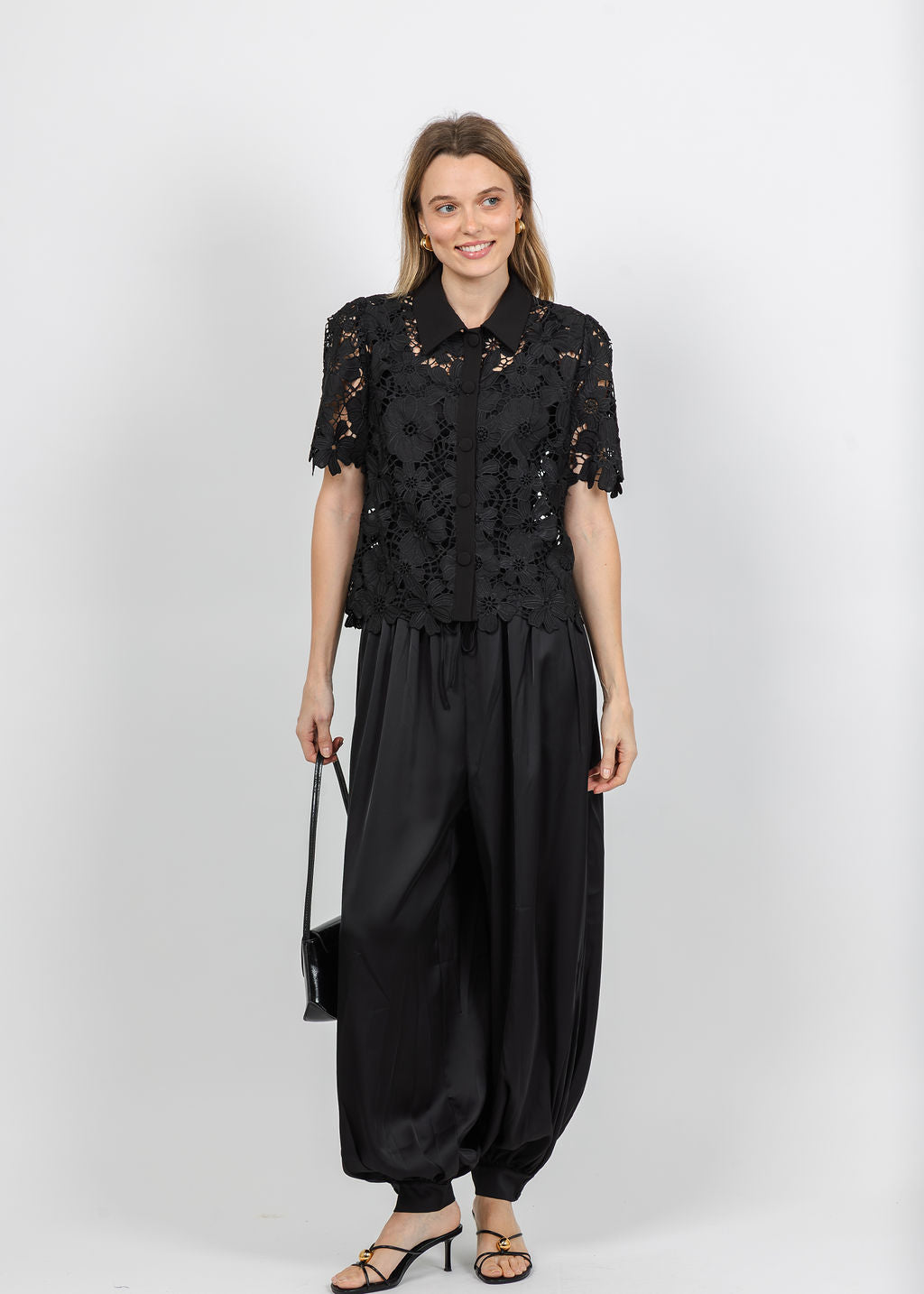 Dani Parker The Dani Lace Top in Black paired with Cinq a Sept Esme Satin Verne Pant in Black available at Barbara Katz