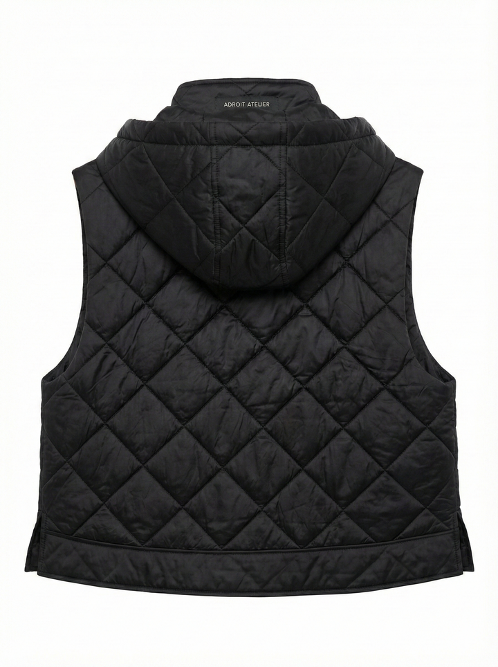 Adroit Atelier Daniela Sleeveless Diamond Quilted Vest With Detachable Hood in Black available at Barbara Katz