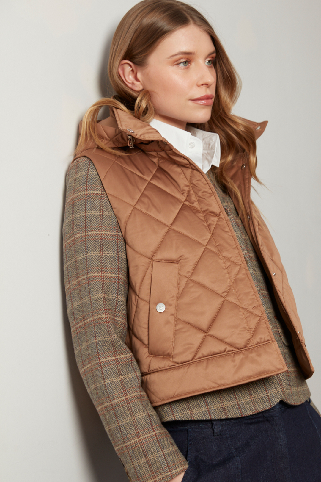 Adroit Atelier Daniela Sleeveless Diamond Quilted Vest With Detachable Hood in Bronze available at Barbara Katz