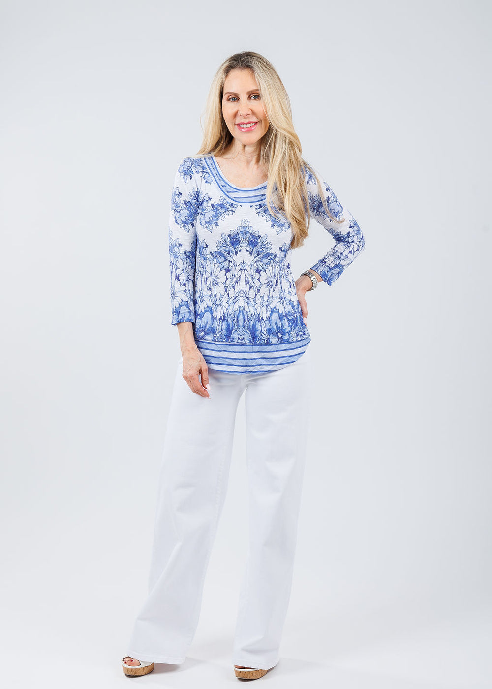 David Cline Christi Double Crew Neck Top in Royal paired with Frame Le Slim Palazzo Jeans in White available at Barbara Katz