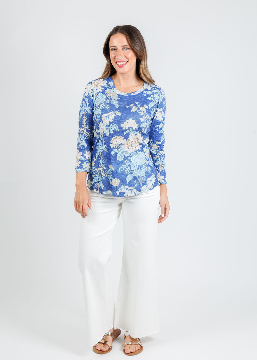David Cline Rosalie Crew Neck Top in Azure paired with Frame Le Palazzo Crop Jeans in Au Natural Clean Raw After available at Barbara Katz