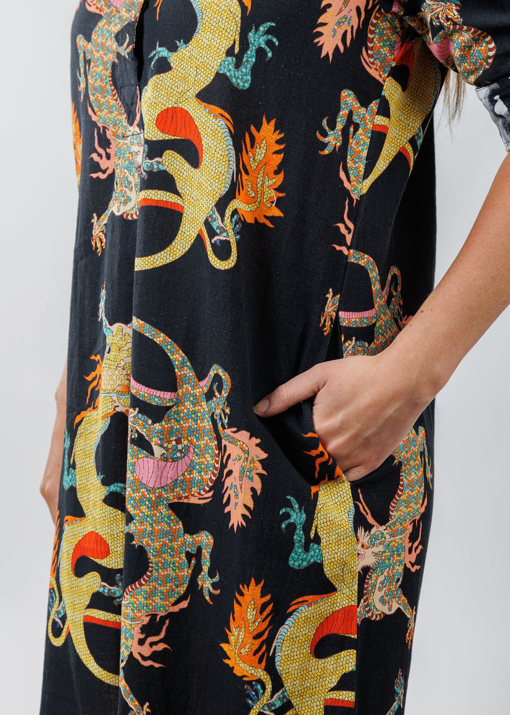 Dizzy-Lizzie Chatham Dress in Black with Dragon Print available at Barbara Katz