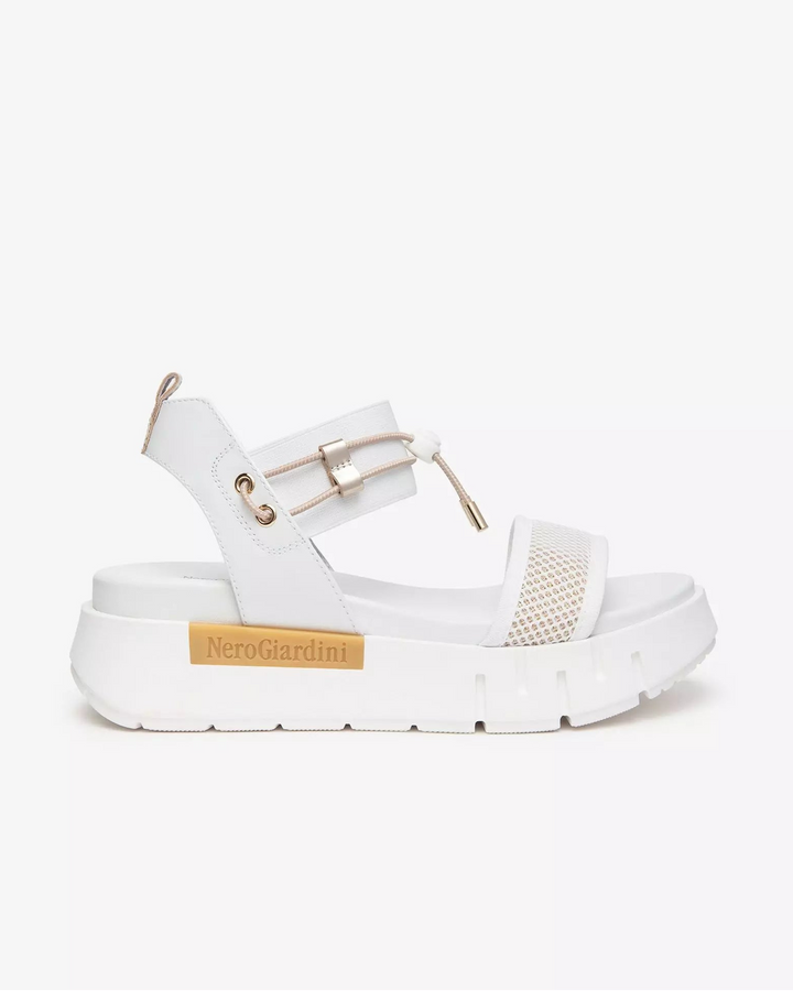 NeroGiardini Chey Bungee Platform Flat Sandal in White available at Barbara Katz
