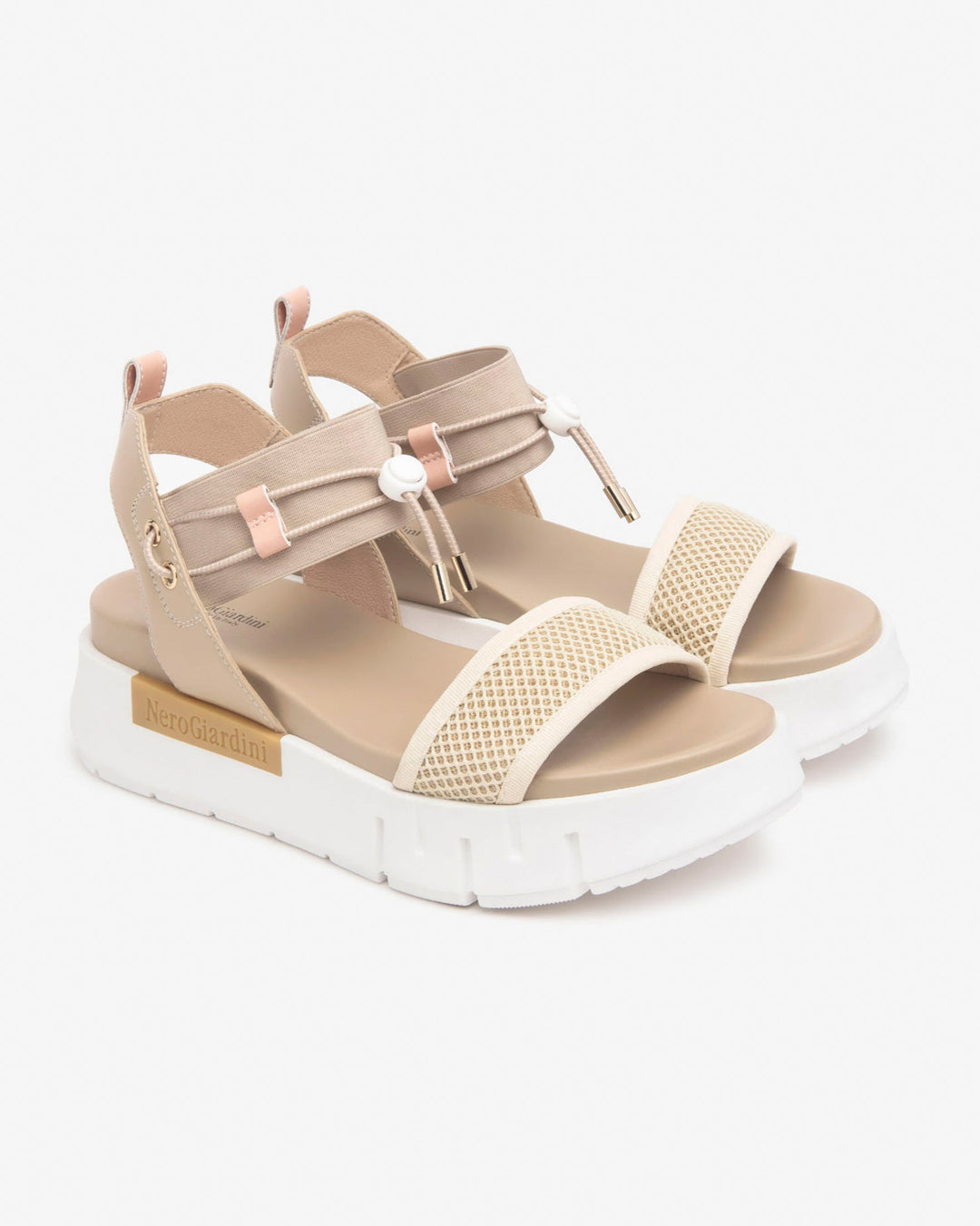 Nero Giardini Bungee Platform Flat Sandal in Beige available atBarbara Katz