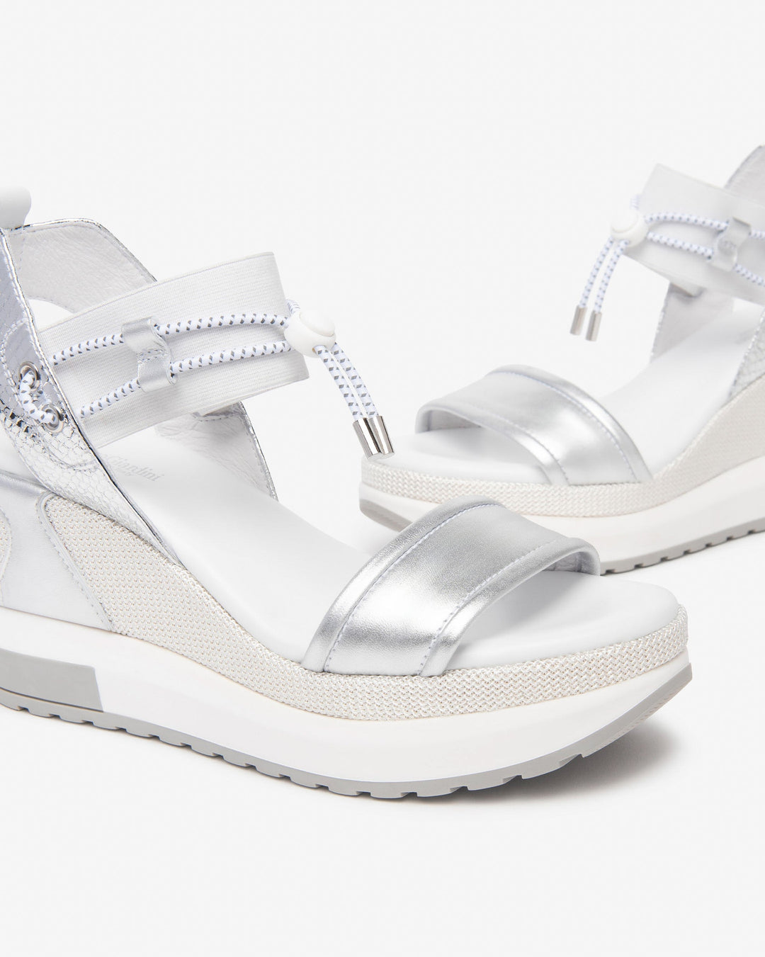 NeroGiardini Satcha Bungee Platform Wedge Sandal in Silver available at Barbara Katz