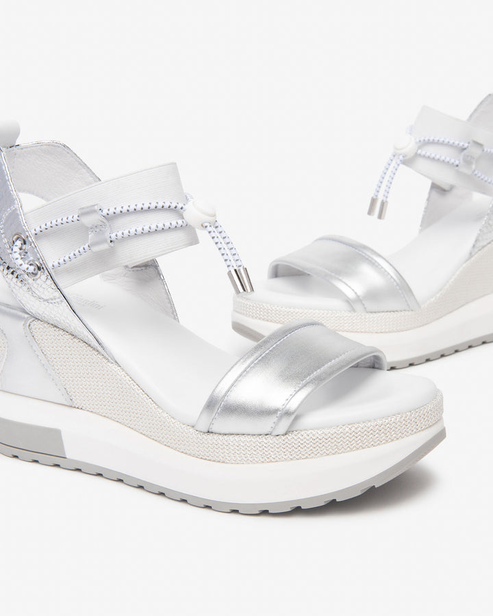 NeroGiardini Satcha Bungee Platform Wedge Sandal in Silver available at Barbara Katz