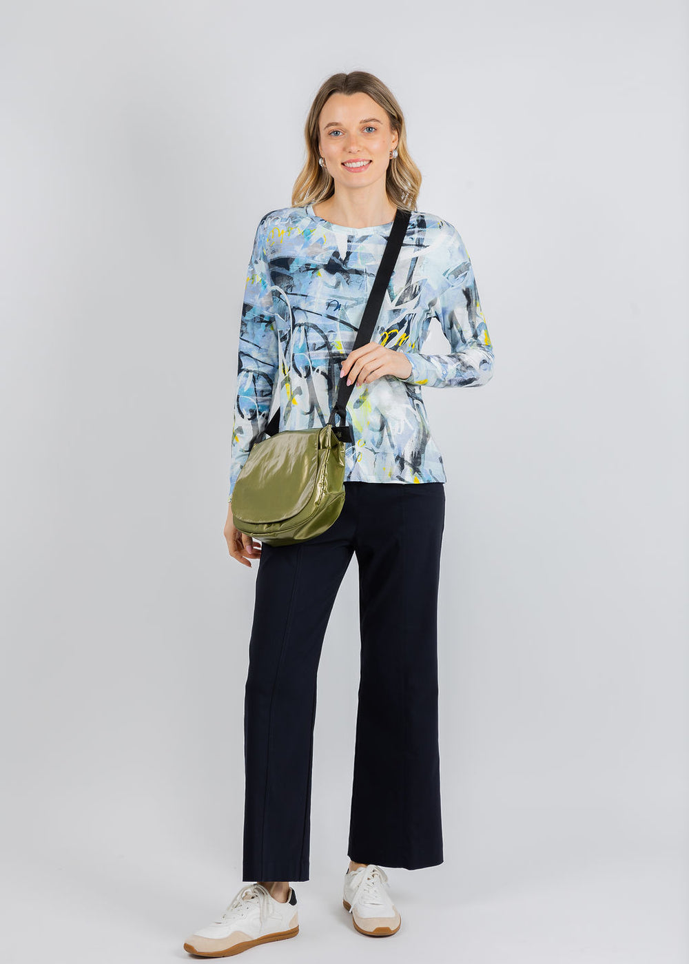 Elliott Lauren Collage Crew Neck Long Sleeve Top in Blue paired with Elliott Lauren 27" Control Stretch Grommet Wide Leg Pants in Navy available at Barbara Katz