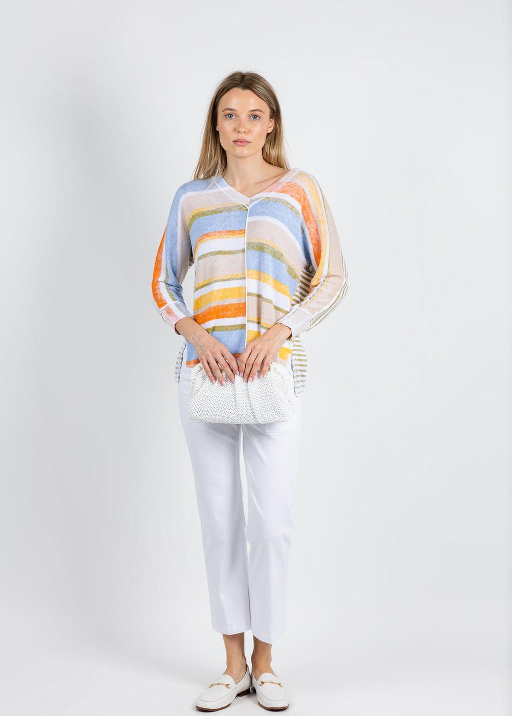 Elliott Lauren Blocked Off Printed Stripe V-Neck Top in Sage paired with Elliott Lauren Modern Twill Pull-On Pants With Pocket in White available at Barbara Katz