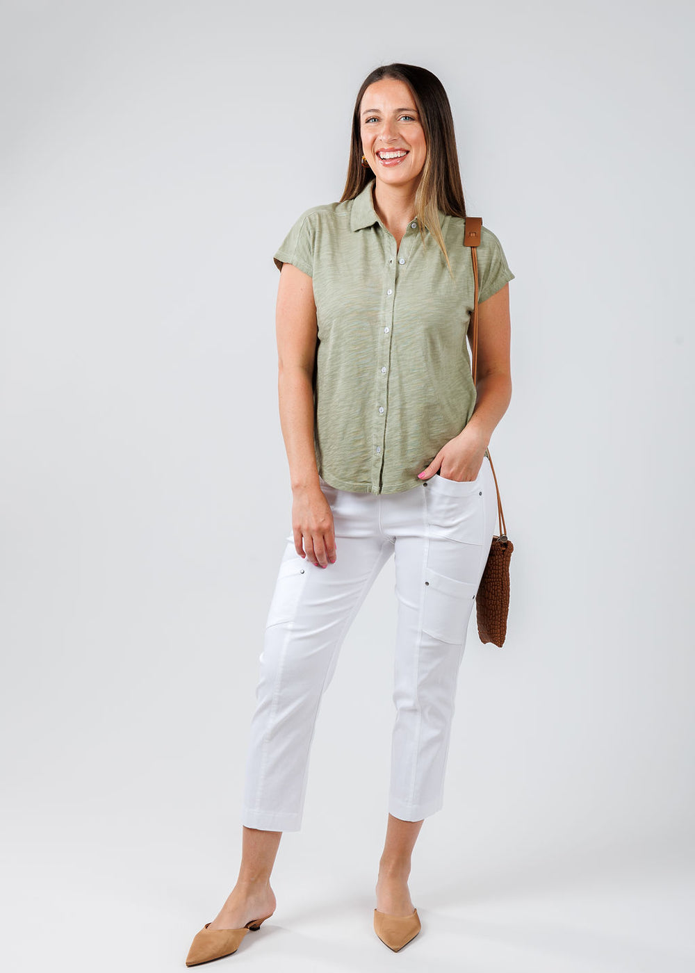 Elliott Lauren Charlotte Button Front Tee With Collar in Thyme paired with Elliott Lauren Crop Cargo Pants in White available at Barbara Katz