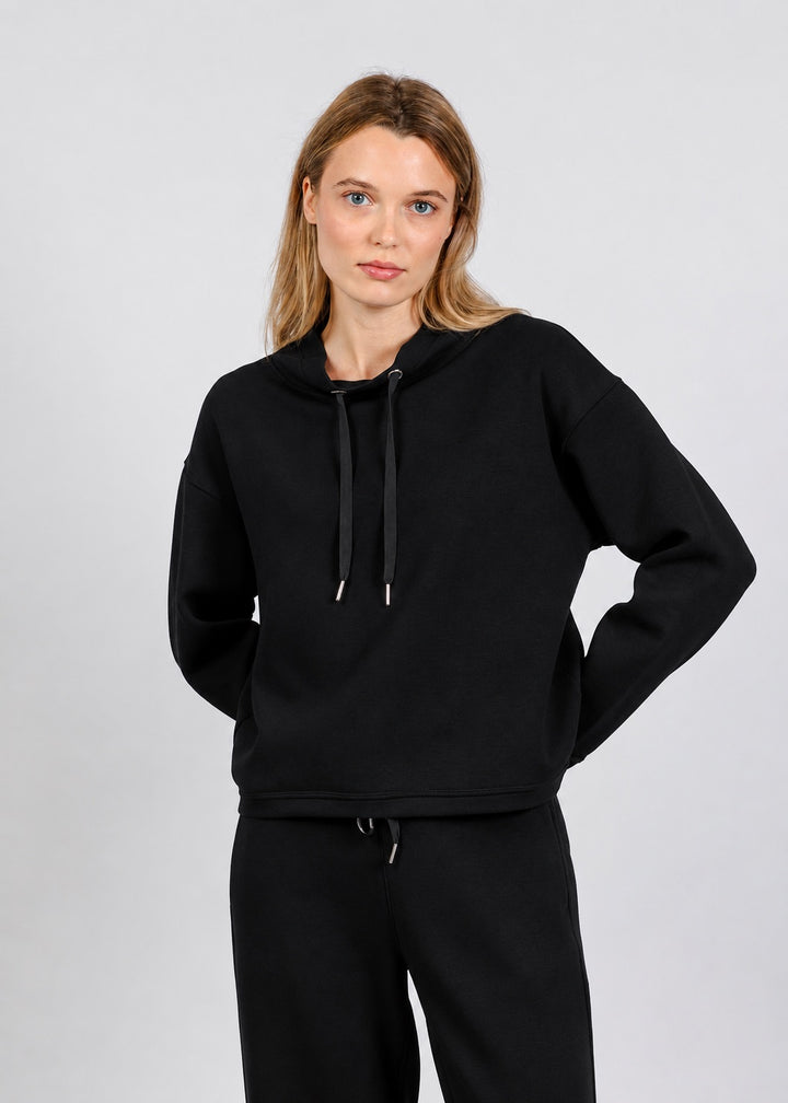 Elliott Lauren Comfort Zone Funnel Neck Top in Black available at Barbara Katz