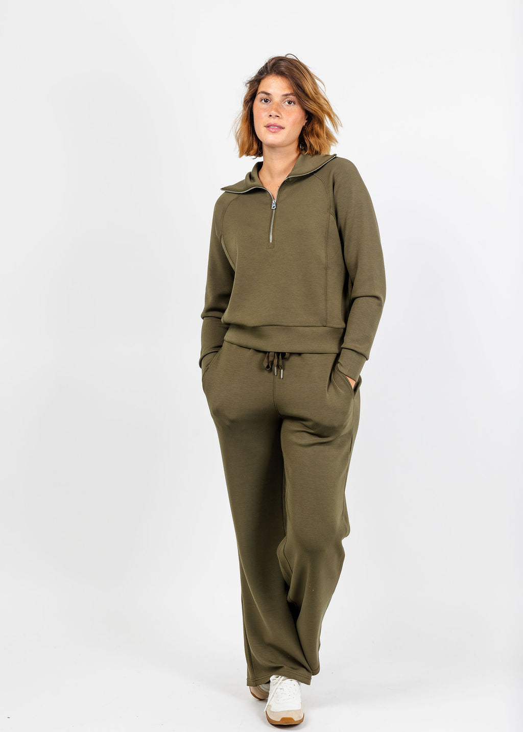 Elliott Lauren Comfort Zone Half Zip Seam Top in Olive paired with matching Comfort Zone Wide Leg Pant available at Barbara Katz