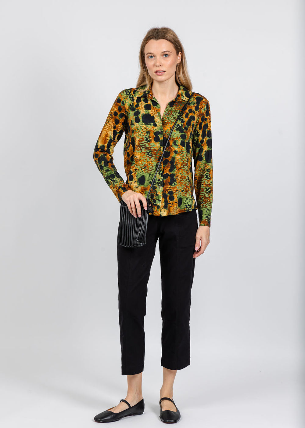 Elliott Lauren Printed Knit Top in Lava  paired with Elliott Lauren Control Stretch Cargo Pant in Black available at Barbara Katz