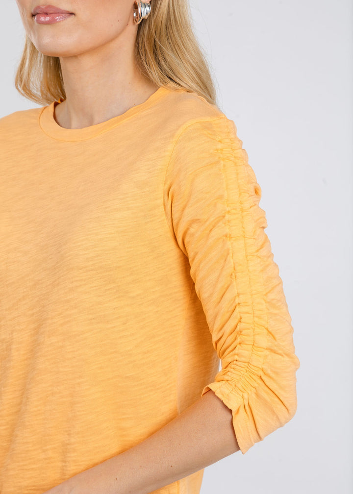 Elliott Lauren Crissy Crew Neck Ruched Sleeve Tee in Creamsicle available at Barbara Katz