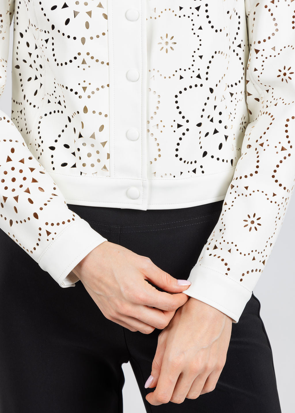 Elliott Lauren Laser Cut Faux Leather Jacket in White available at Barbara Katz