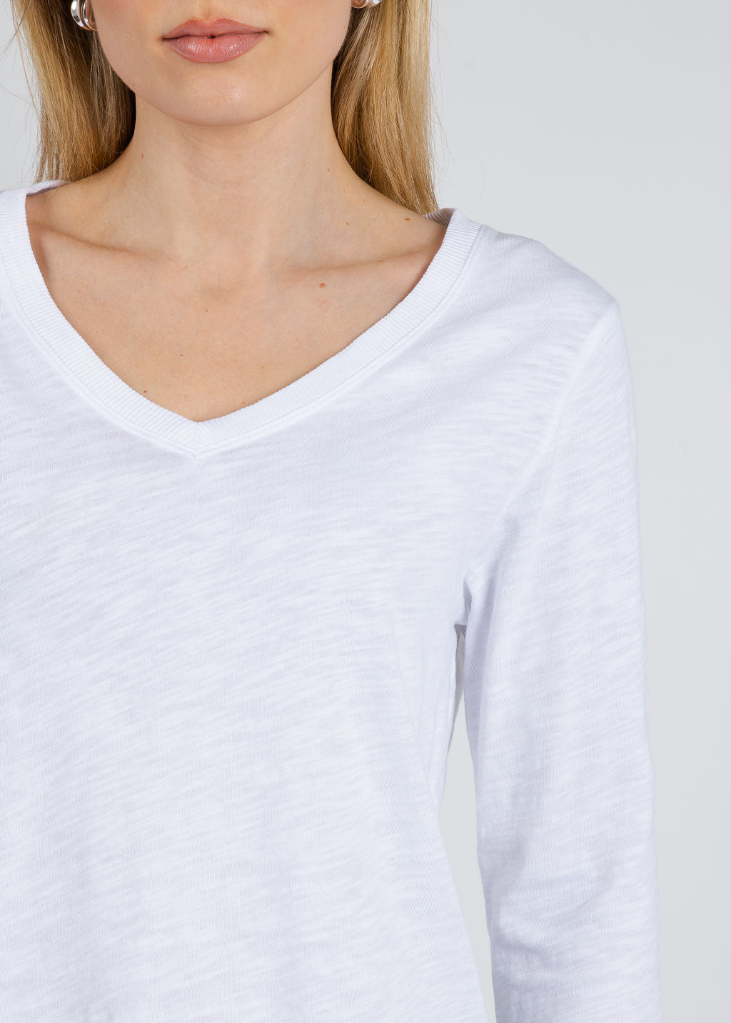 Elliott Lauren Silvie Rib 3/4 Sleeve V-Neck Tee in White available at Barbara Katz
