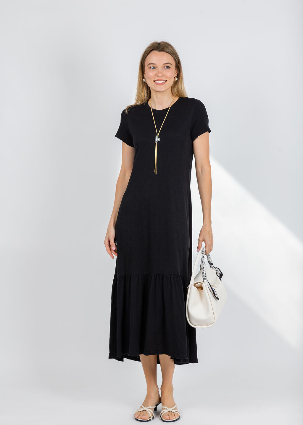 Elliott Lauren Susie Short Sleeve Dress With Ruffle in Black available at Barbara Katz