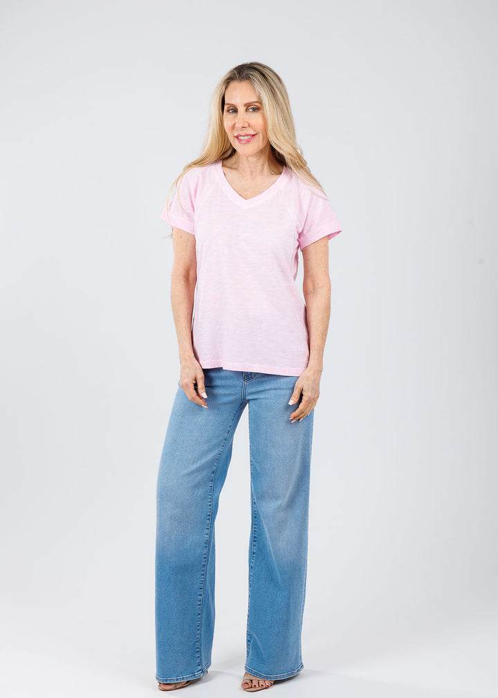 Elliott Lauren Tina Raglan Short Sleeve V-Neck Tee in Petal Pink paired with Frame Le Slim Palazzo Jeans in Honeymoon available at Barbara Katz