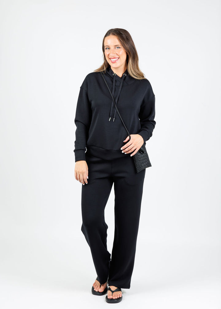 Elliott Lauren Comfort Zone Cowl Sweater in Black paired with matching Comfort Zone Sweatpants available at Barbara Katz